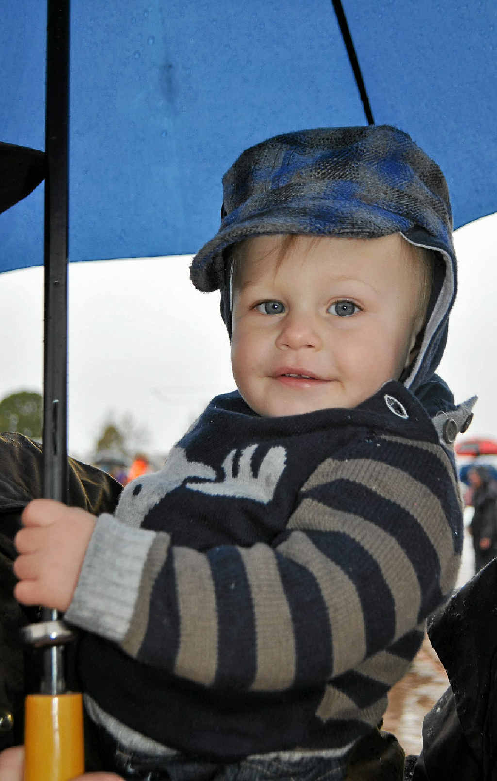 Billy Thompson stays dry at the Allora Auction. Billy Thompson stays dry at the Allora Auction.